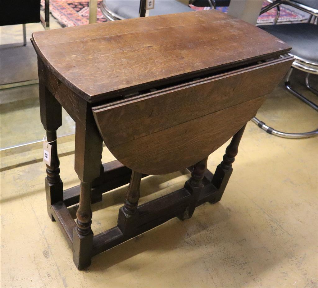 A small oak gateleg table, width 65cm, depth 34cm, height 66cm